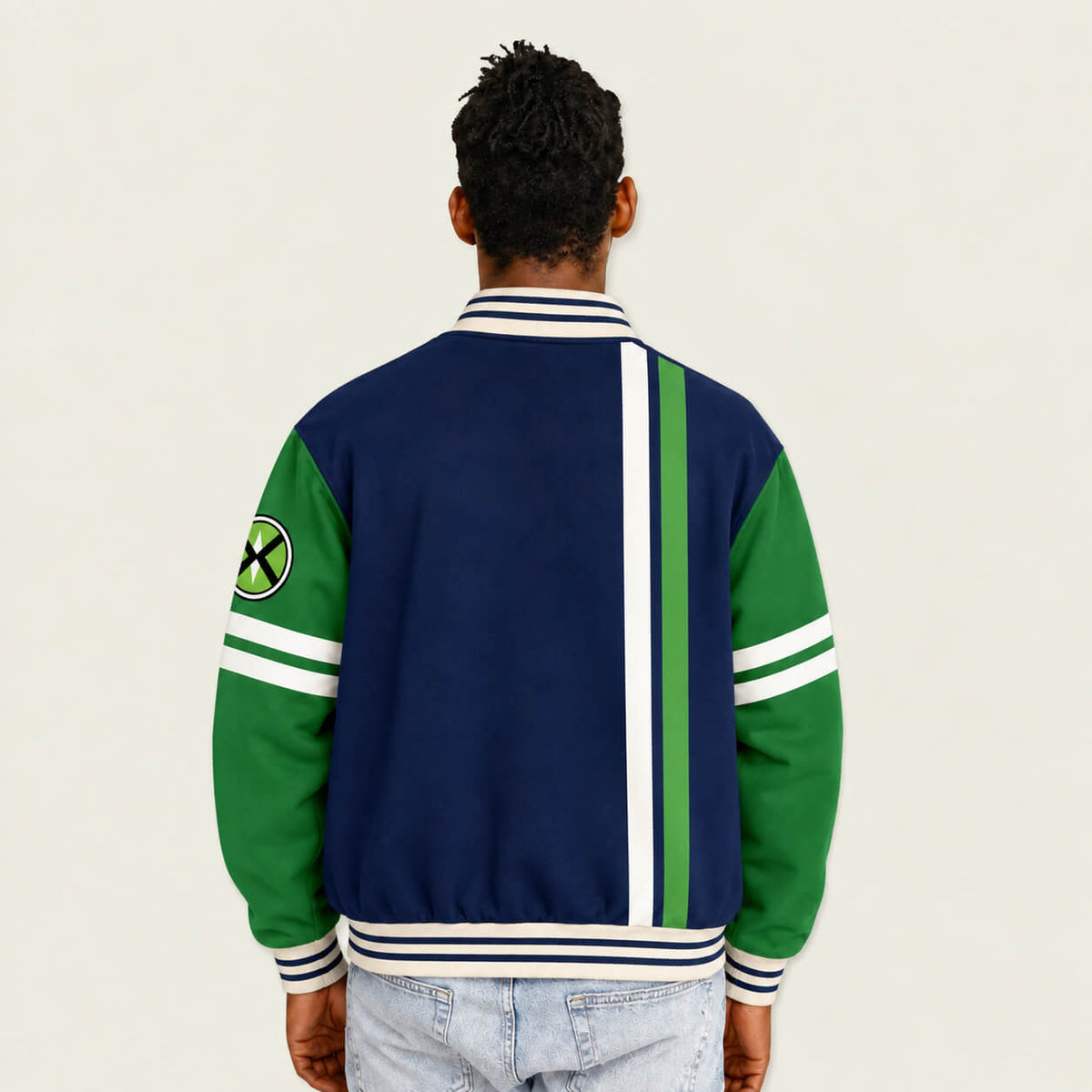 1. Model wearing Ben 10 navy and green varsity jacket back view