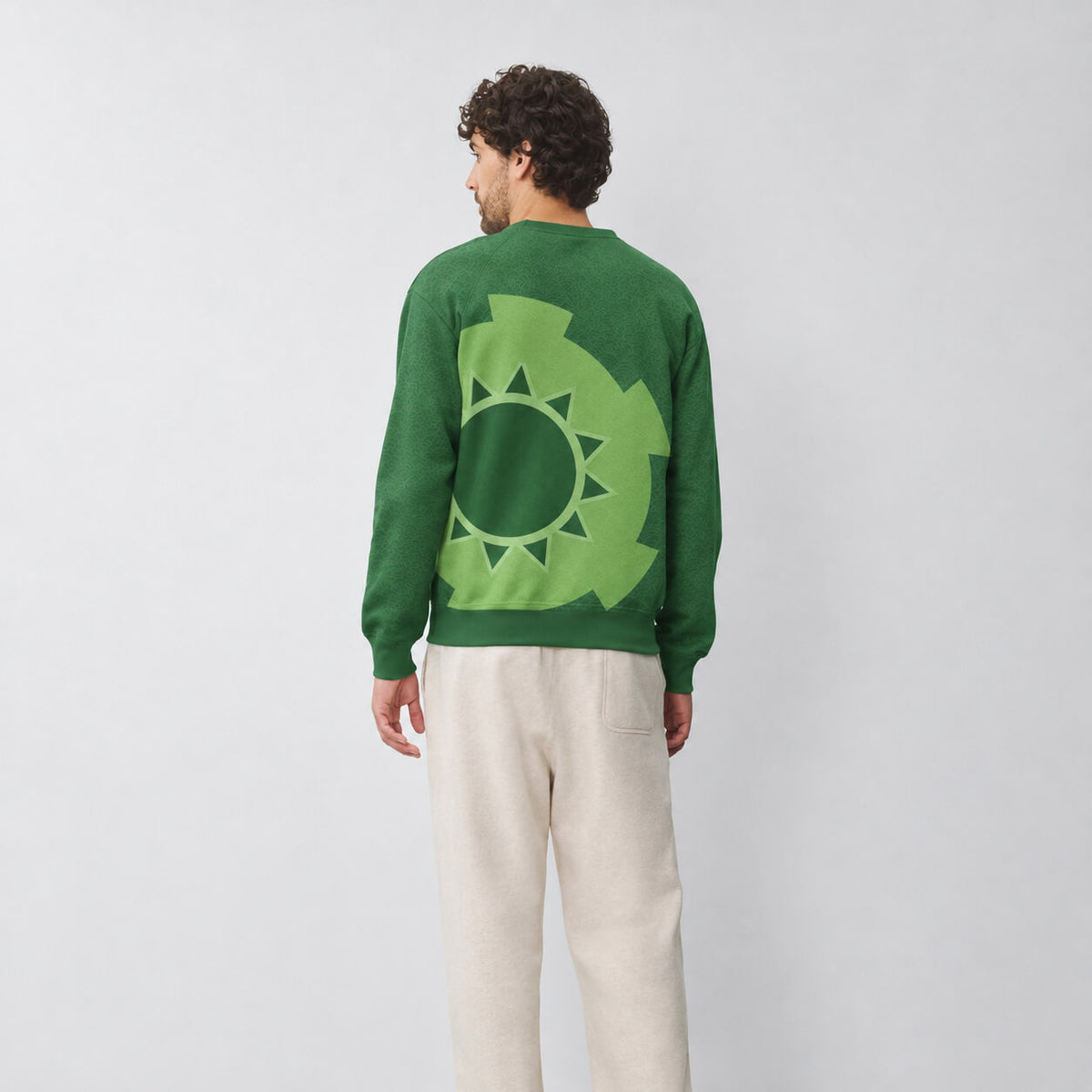 Back view of Roronoa Zoro One Piece sweatshirt featuring a large light-green circular emblem