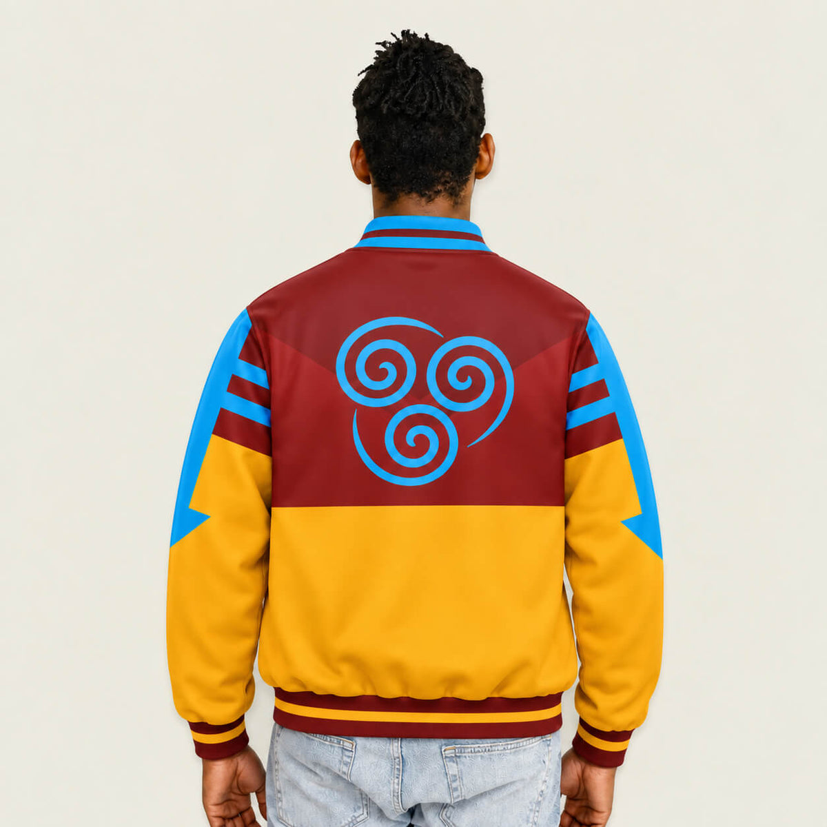 1. Model wearing Avatar Aang varsity jacket with Air Nomad back symbol