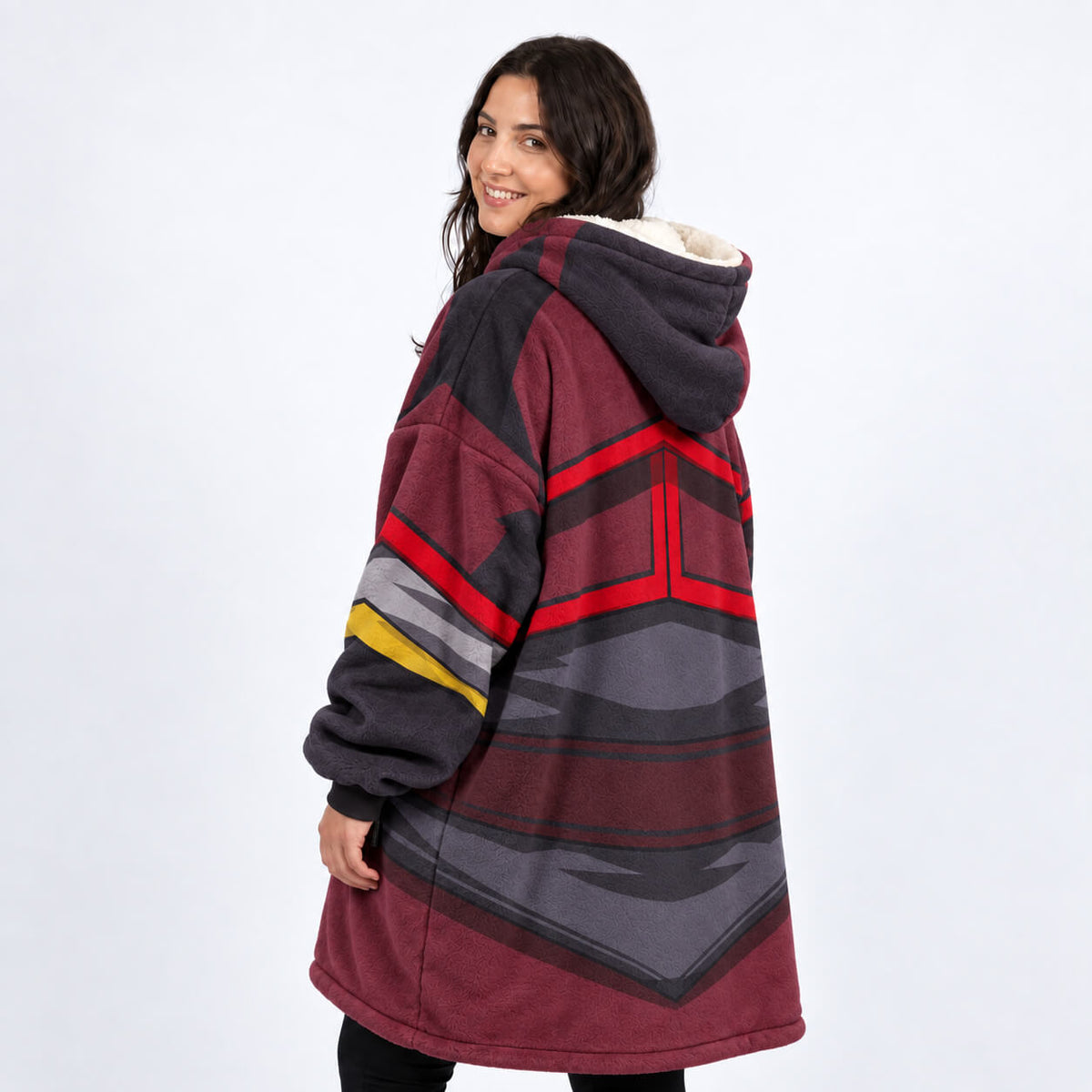 Side view of Avatar Fire Nation blanket hoodie with gold accents