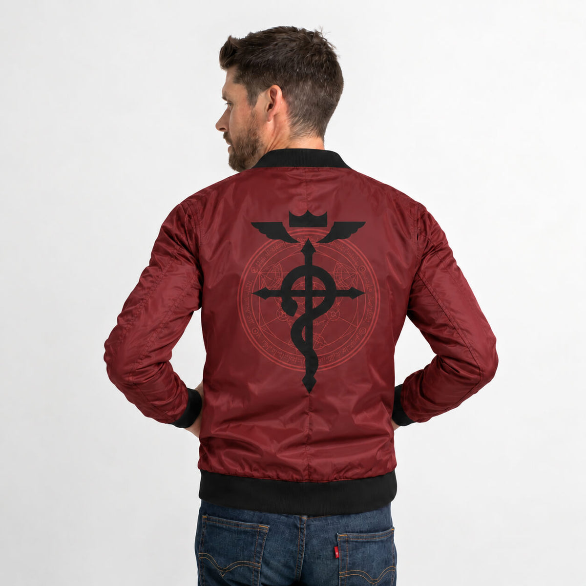 Model wearing burgundy Fullmetal Alchemist bomber jacket with black Flamel symbol across back