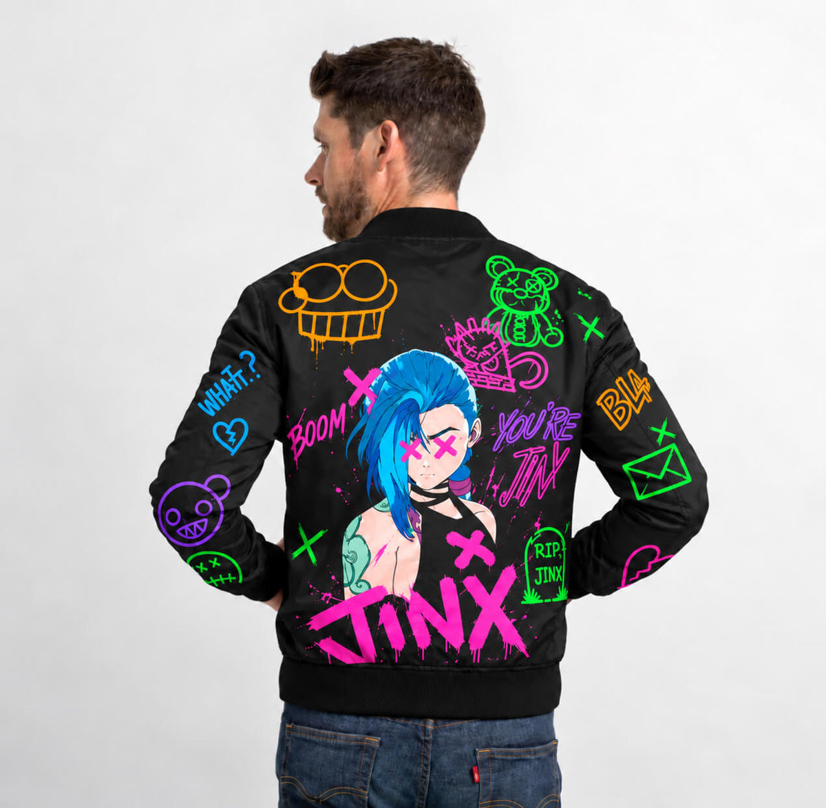 Model wearing black Jinx Arcane bomber jacket showing neon graffiti artwork across the back