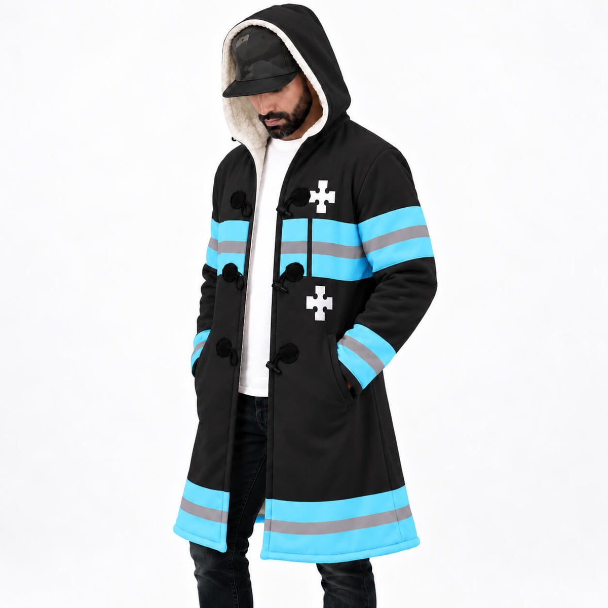 Model wearing black Fire Force hooded cloak coat angled front view