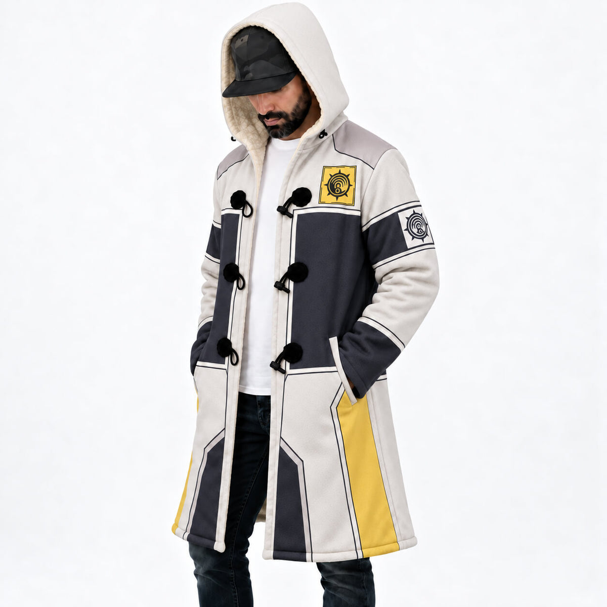1. Model wearing Tamsy Caines hooded cloak coat angled front view