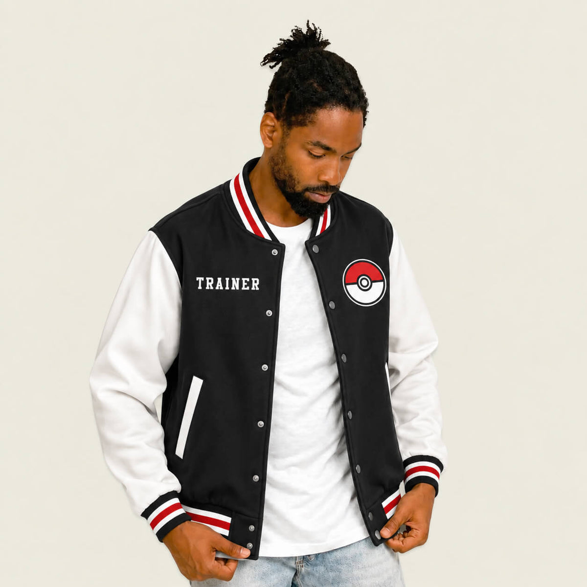 Model wearing Pokémon Trainer varsity jacket front view