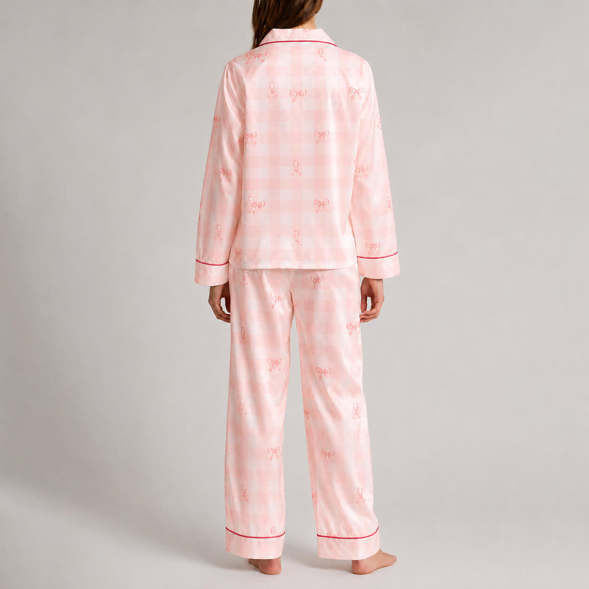 Back view of pink satin pajamas with delicate gingham pattern