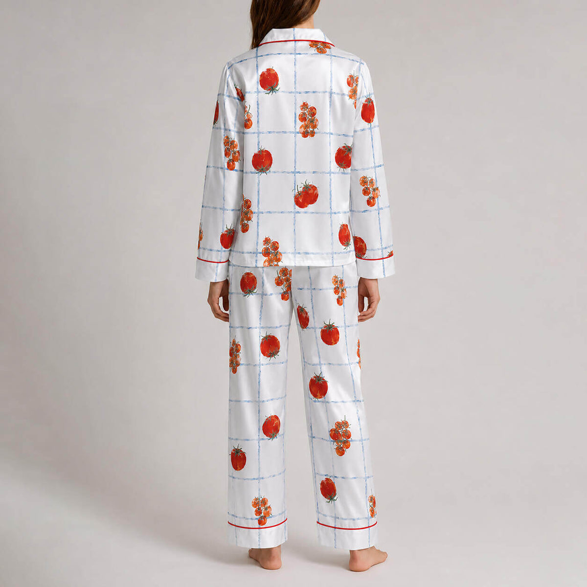 Back view of white satin pajama set with orchard-inspired print